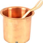 Ashtok Copper Panchapatra and Achmani Pali Set. Copper Glass and Spoon Set for Rituals. Colour Reddish Brown. Diameter Glass 3 Inches and Height 2.5 Inches. Length of Spoon 5 Inches. Pack of 2 (1 Glass and 1 Spoon)